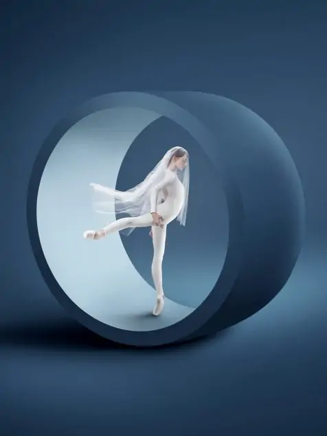 A ballerina stands en pointe on one foot in a sculptural wheel highlighting the drama and beauty of the Pennsylvania Ballet