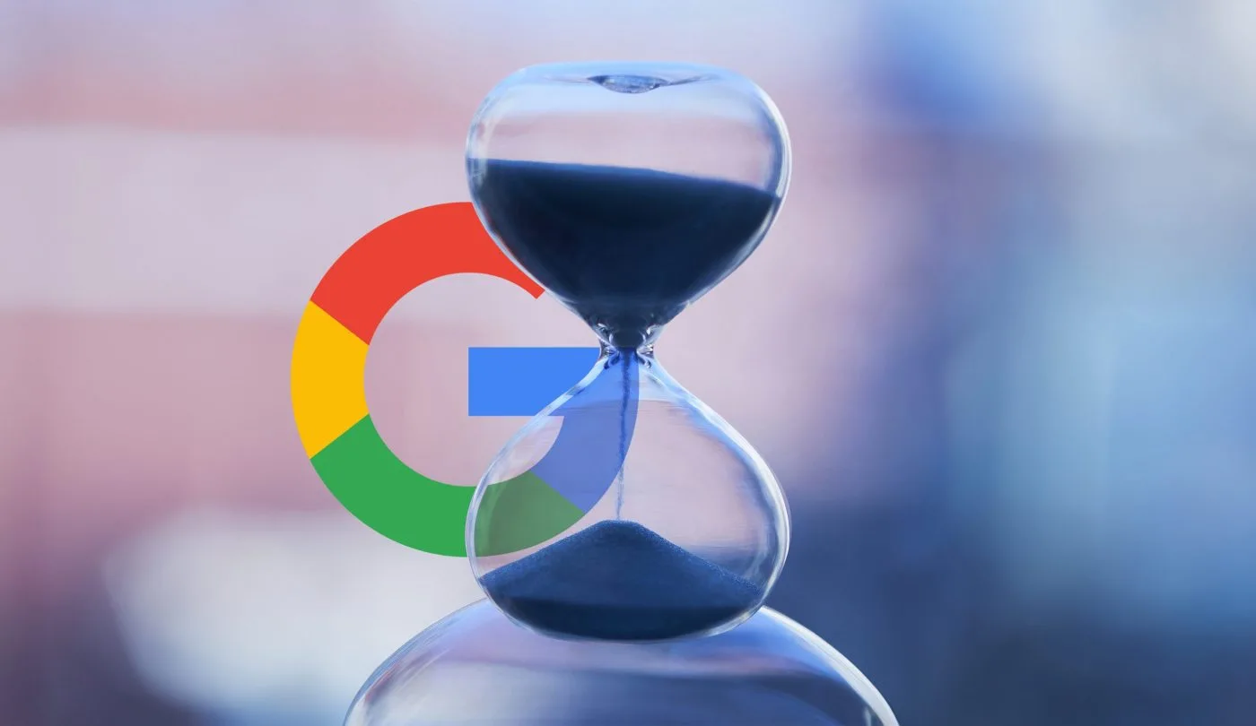 Hourglass with sand falling inside and Google 