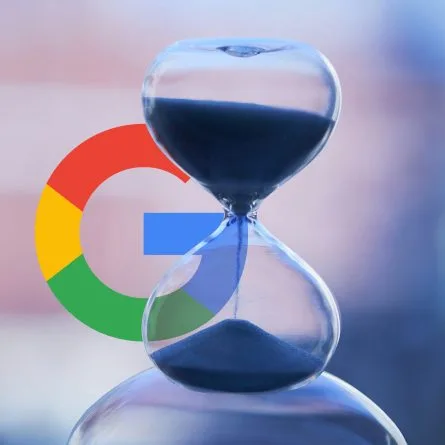 Hourglass with sand falling inside and Google 